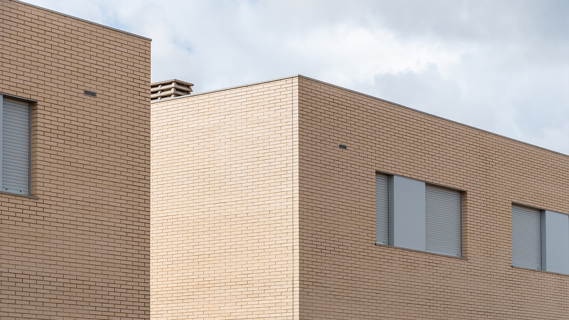 Commercial building built with beige bricks